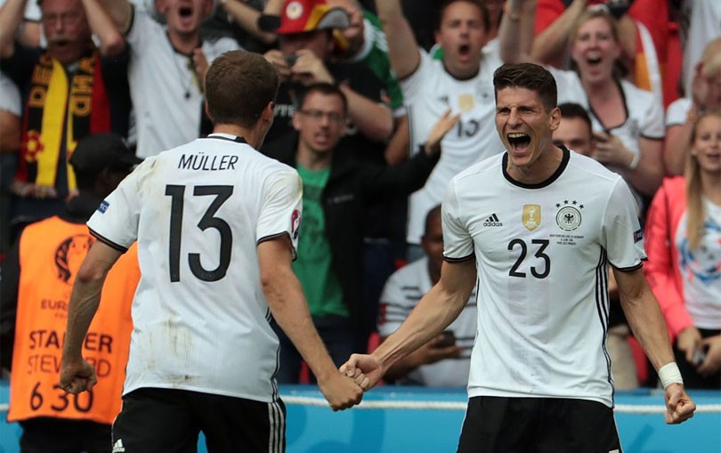 Germany reached the last 16 with a 2-2 draw with Hungary